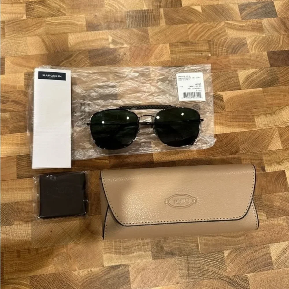 Tod's Black Frame Sunglasses with Dark Green Lenses